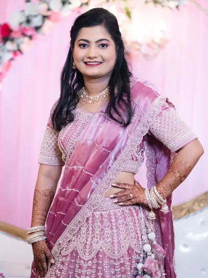 A portrait of the bride in her reception lehenga, showing the transition from the traditional Marathi wedding ceremony to the evening celebration.