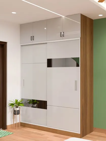 A full view of the glossy grey sliding wardrobe with loft storage above, demonstrating how we maximize vertical space for storage in bedrooms.