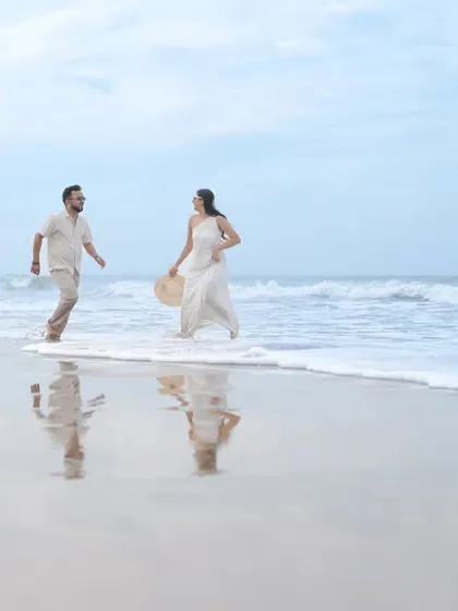 I love getting creative with props to tell a unique story. On the beaches of Goa, we used this ornate mirror to create a surreal, artistic reflection of the couple's bond against the vastness of the ocean.