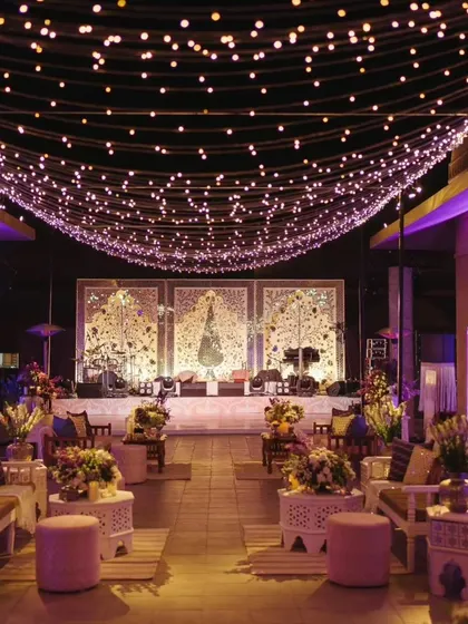 The stunning stage and seating area under a canopy of fairy lights for the Sufi Night. The decor was designed to be both grand and intimate.