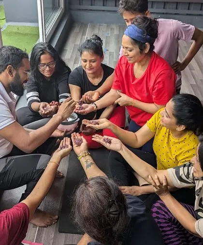 Another angle of our community circle, showing the connection and shared energy from a different perspective.