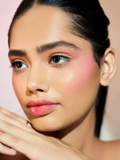 This angle shows the beautiful sheen on the skin, a result of proper skin prep and highlighting techniques taught in my course.