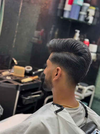 The back view of the pompadour, showing the clean taper and how the volume is built up.