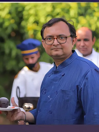 Our head chef presenting one of his signature dessert creations. He personally oversees the menu development and execution for our most exclusive events.