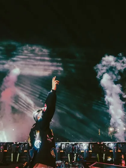 Pointing to the sky as the pyro and smoke effects go off. These are the moments that make a show unforgettable.