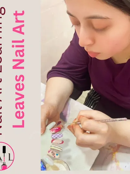 This student is learning how to paint delicate leaves, a beautiful and nature-inspired nail art design.
