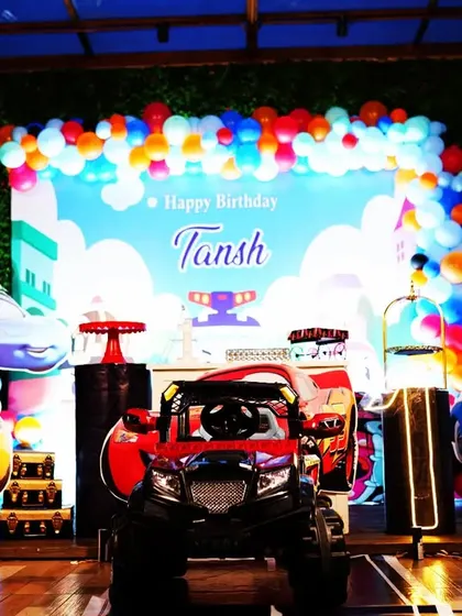 A full stage setup for Tansh's car-themed birthday party. We included large character cutouts, a custom backdrop, and a colourful balloon garland to bring the world of cars to life.