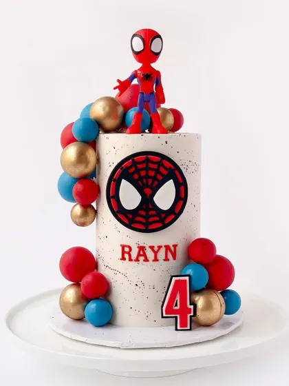 A modern and stylish Spider-Man cake for a 4th birthday. This design features a clean look with a bold Spider-Man logo and fun balloon-like spheres in classic red, blue, and gold.