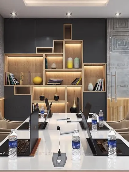 Another view of the conference room, showing a creative, illuminated bookshelf that adds both storage and a design element.