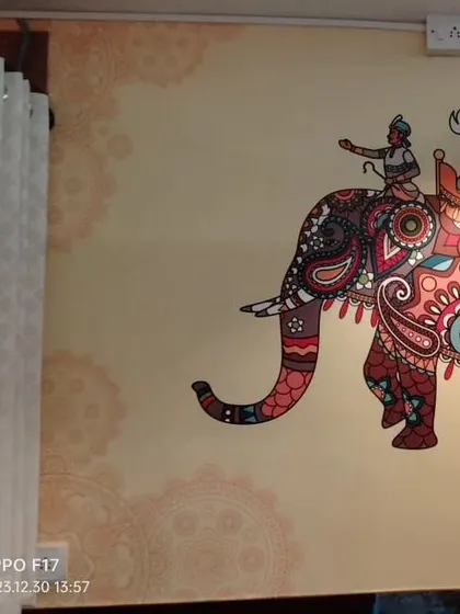A detailed, decorated elephant mural, perfect for adding an Indian ethnic touch to a commercial or residential space.