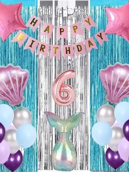 A simple mermaid theme for a 6th birthday. This kit-style decoration includes a blue fringe curtain and various mermaid-themed foil balloons.