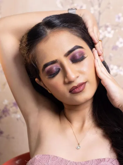 The full look in a classic beauty pose. Students learn how to create makeup that photographs beautifully and helps the model convey a specific mood.
