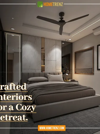 I believe a bedroom should be a cozy retreat. This space combines a custom-upholstered bed, a marble-finish feature wall with integrated lighting, and a mirrored wardrobe to create a sense of sophisticated comfort and tranquility.