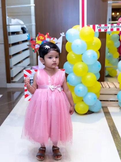 Dressed in her party best. We take beautiful individual portraits of the birthday girl or boy amidst their celebration.