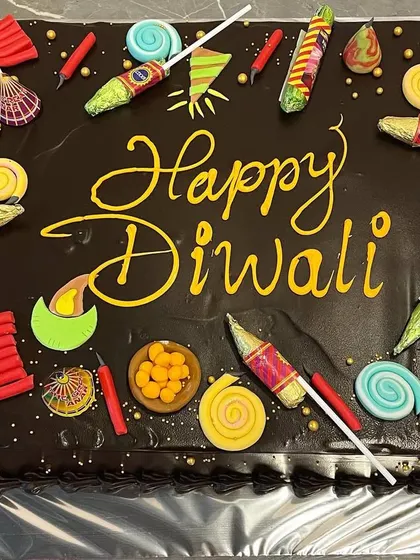 A true Diwali Dhamaka! This huge chocolate cake was decorated with edible firecrackers, diyas, and sparklers, perfect for a big team celebration at the office.