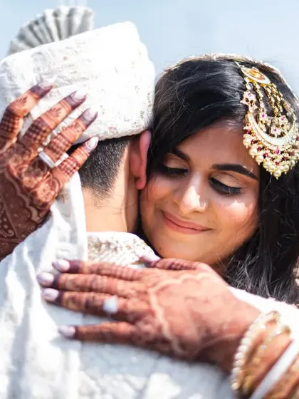This is the "real" in "Raw. Real. Intimate." A simple, heartfelt hug between the bride and groom, full of emotion and connection. These are the moments I live to capture.