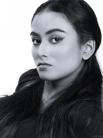 A classic black and white headshot, perfect for a model's portfolio.