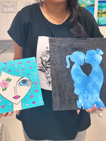 A showcase of two different styles of canvas painting, showing the range of creativity our guests explore.