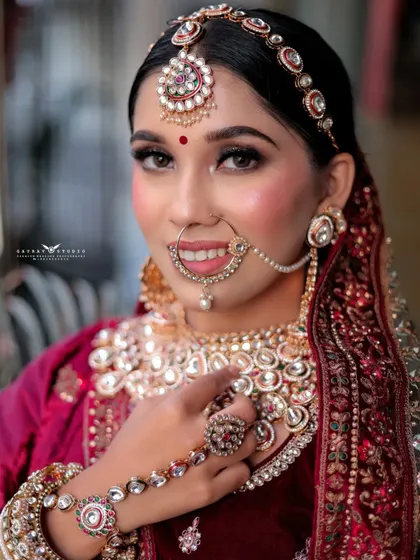 A bright and happy close-up of the bride smiling directly at the camera. This shot is full of life and perfectly captures the joy of a bride on her special day.