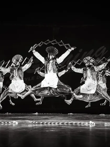 A black and white shot capturing the power and perfect synchronization of a Bhangra crew at the BIG.inning competition. The energy was electric.