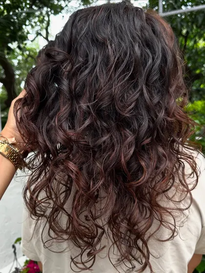 The texture and dimension in these curls are just stunning. This is what happens when you treat curls with the right techniques.