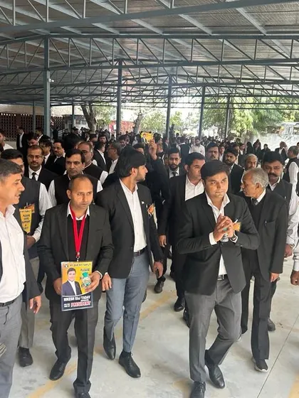 Leading the way during a campaign walk. I am committed to being at the forefront, guiding and fighting for my legal family.