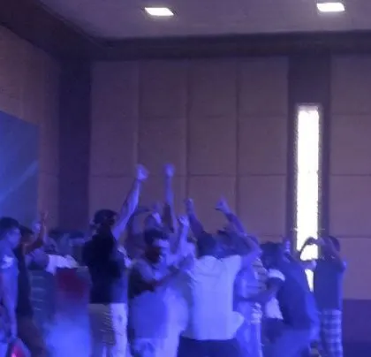 Hands in the air at the Sriram Properties corporate meet.