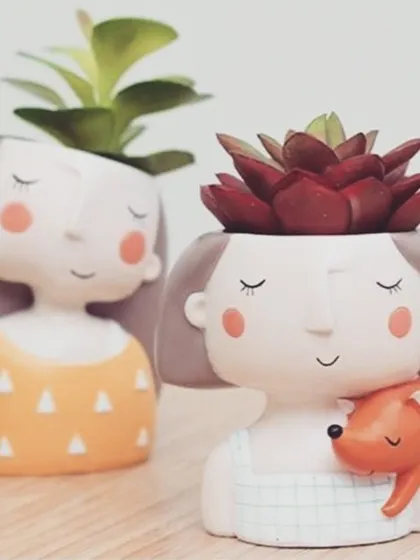 Our collection of mini girl planters, perfect for creating a family of succulents on your windowsill or desk.