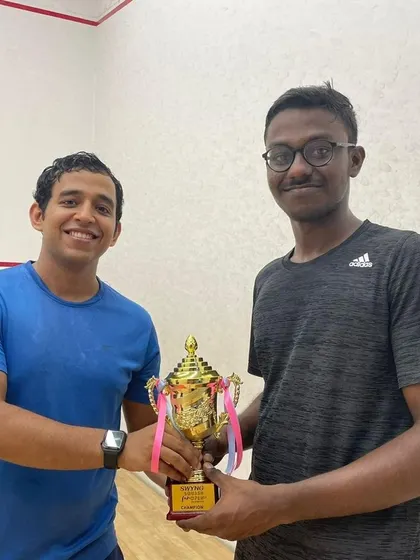 The champion and runner-up from our 'Funovember' squash tournament, celebrating a hard-fought victory.