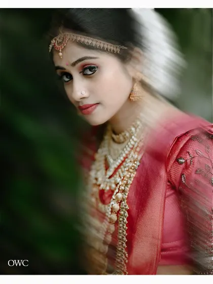An artistic portrait with a motion blur effect, giving the image a dreamy and dynamic feel.