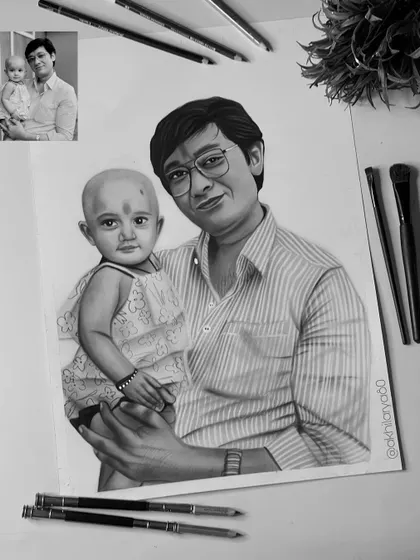 This A3 black and white sketch was created from a very old photograph of a father and his baby. It's a touching way to preserve a precious memory from the past.