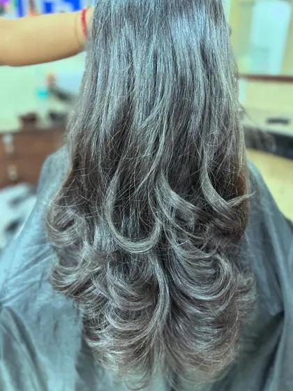 A close-up view of the layers, demonstrating the clean cutting lines and the healthy appearance of the hair.