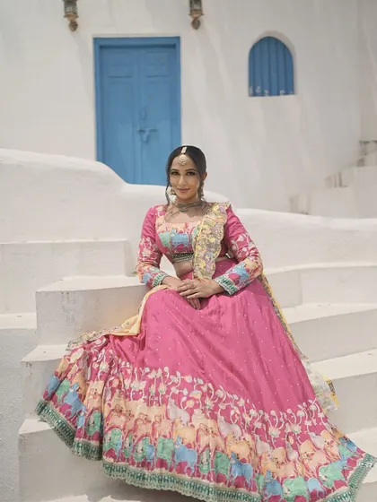 A festive look created for a Navratri-themed photoshoot. The makeup is bright and celebratory, with a flawless base and defined features to match the vibrant pink lehenga.