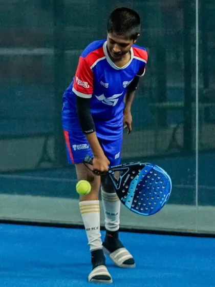 A young player tries his hand at Padel tennis during our National Sports Day event. We believe in promoting a love for all sports.