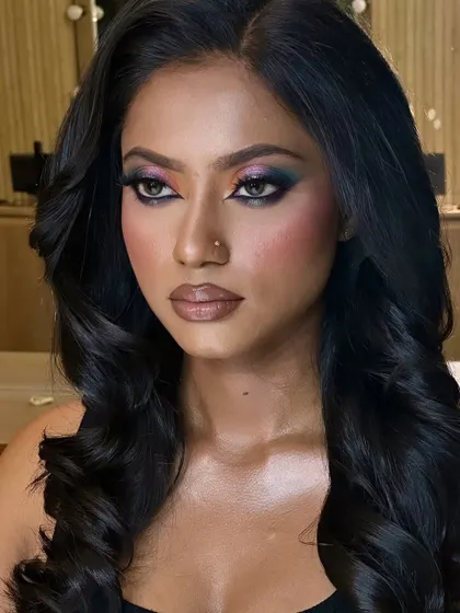Another angle of this royalty-inspired look. The glossy lip and glowing skin balance the dramatic eyes perfectly.