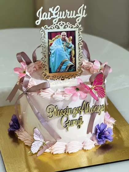 Honoring Guru Ji's birthday with a special collection of divine cakes. Each one is crafted with love and devotion, featuring elegant toppers and floral details.