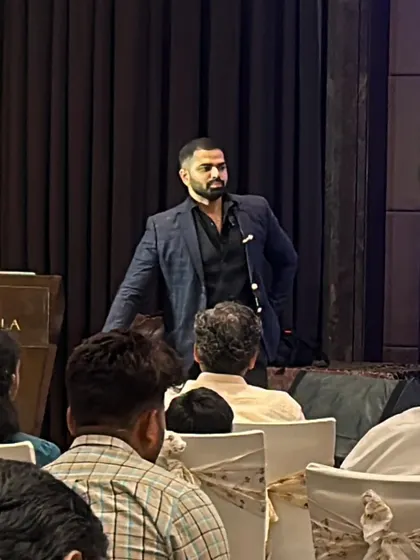 Addressing the audience during an intimate corporate event. In these settings, I can share more detailed stories and psychological insights.