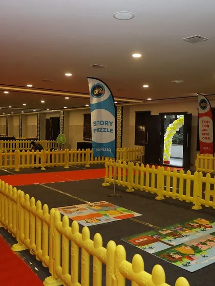 Another perspective of the puzzle and activity area at the Klay family event.