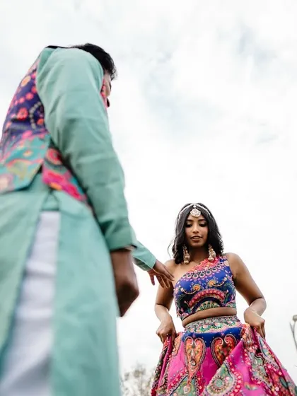 A creative, low-angle shot of a couple during their Mehendi. We use unique perspectives to create dynamic and interesting photos.
