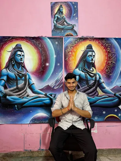 Here I am with two commissioned Mahadev paintings, one large and one small. It is an honor to create these pieces for fellow devotees. Om Namah Shivay.