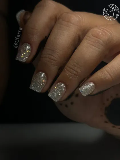 Another angle of the sparkling glitter nails, perfect for any party or celebration.