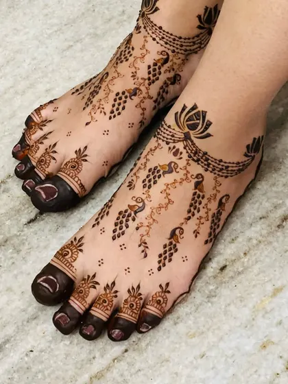 Another angle of the peacock and grape vine design, showing the details on the toes and the beautiful flow of the pattern.