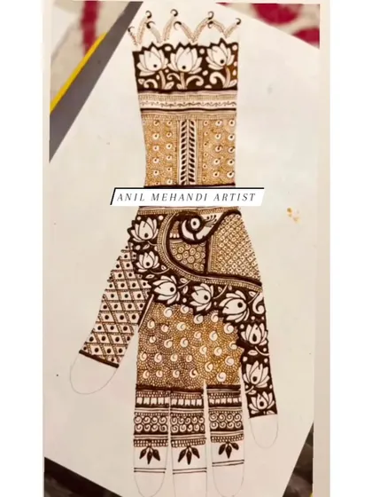 This is a design sketch for a bridal hand, featuring a mix of lotus, peacock, and geometric patterns. We can plan your entire mehendi design on paper before applying it.