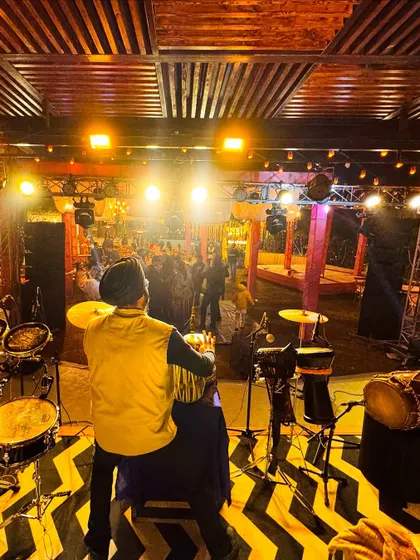 From behind the console, getting ready to drop the next beat. Every performance is a new opportunity to create magic.