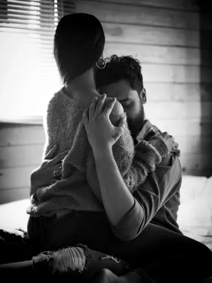 Sometimes, the quietest moments speak the loudest. This intimate black and white pre-wedding photo captures the deep connection and comfort you find in each other's arms, away from the world.