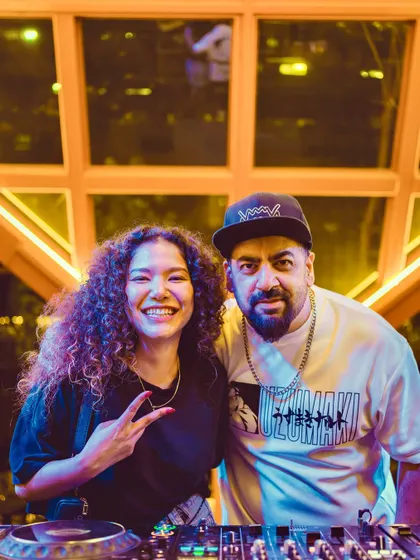 Posing with the talented percussionist Deep at ICB. Our 'untamed duo' sets combine DJ beats with the raw energy of live percussion.