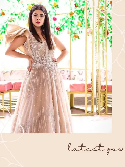 Radiant elegance. This breathtaking beige gown with a structured shoulder detail captures the essence of timeless beauty.