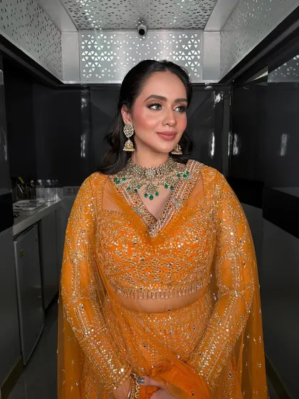A candid shot of the Roka bride, her smile lighting up the room.