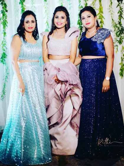 A group of lovely ladies ready for the sangeet. I designed a variety of custom lehengas and crop top sets in shades of blue and mauve for a glamorous, coordinated look.