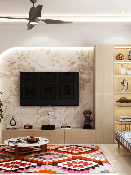 The TV unit in this eclectic living room features a textured back panel and an open-shelf display unit, providing both storage and a place for decor.